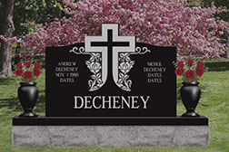 Custom Monument with cross and urns with flowers