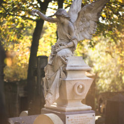Angel monument over a gravesite